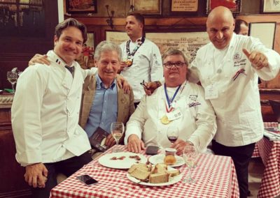 On the laps of Michel Escoffier, with Christian Millet and Pierre Miecaze, president and director of Les Cuisiniers de France